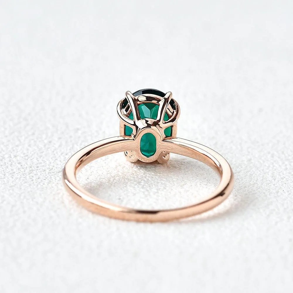 Oval Shaped Emerald Rose Gold Ring