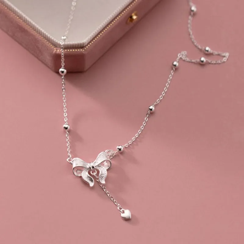 Sterling Silver Astonishing Bow Necklaces