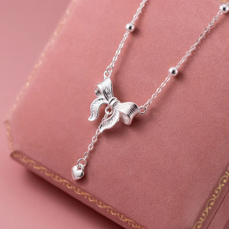 Sterling Silver Astonishing Bow Necklaces