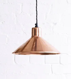 Thea pendant light in copper with copper interior