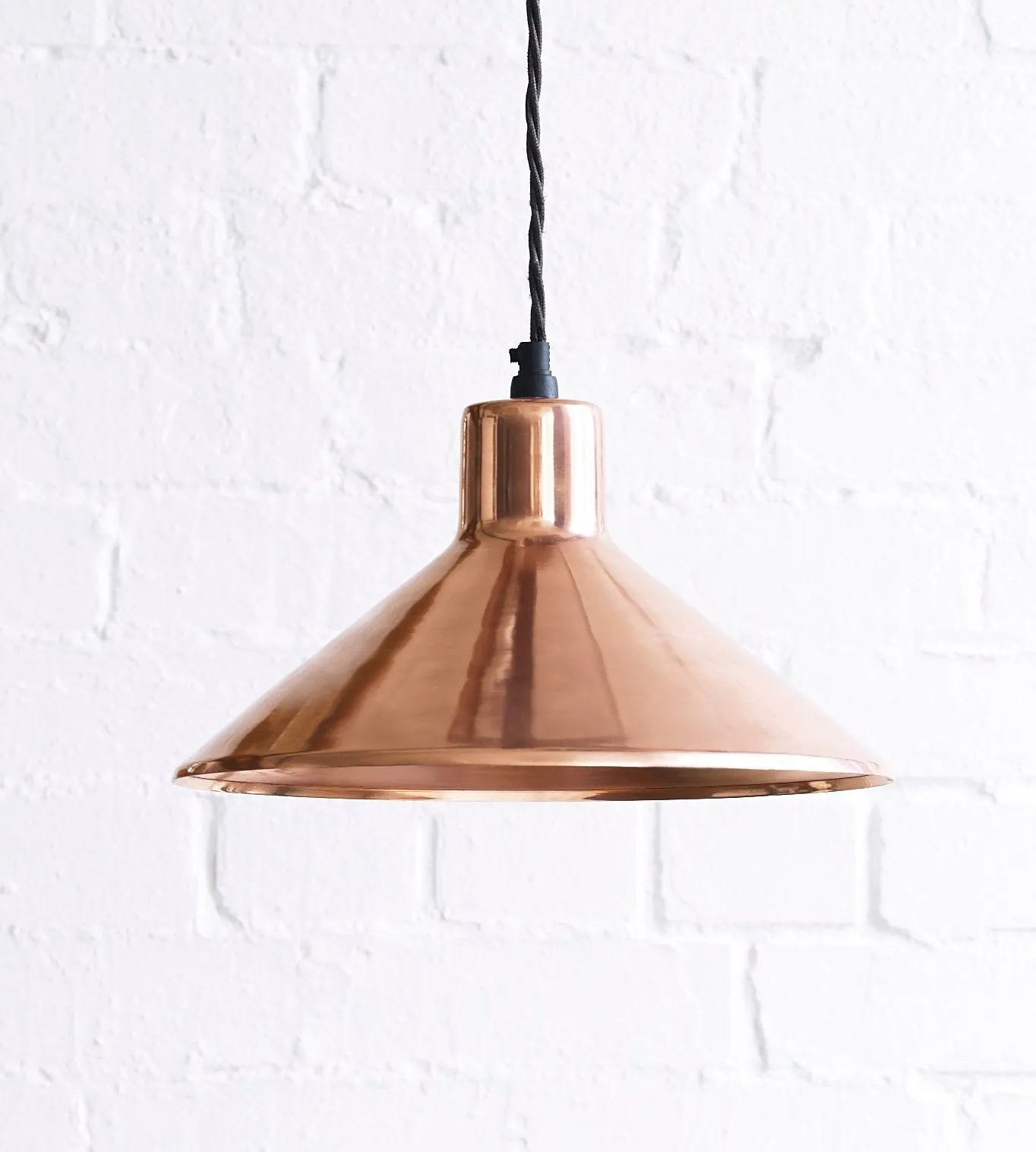 Thea pendant light in copper with copper interior